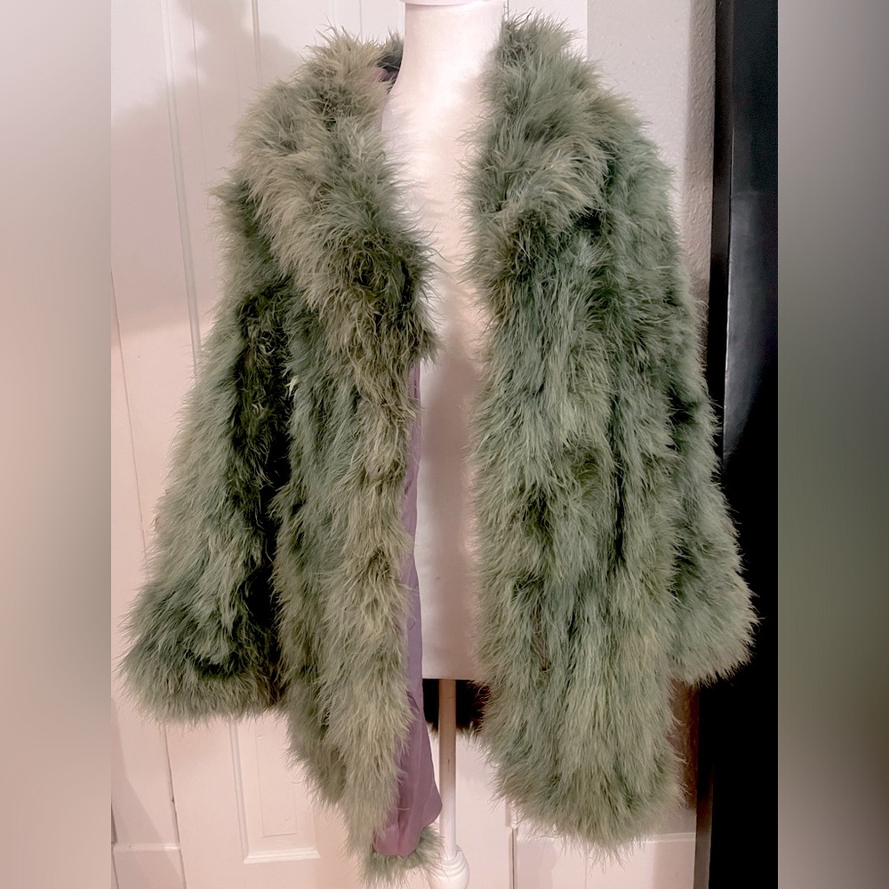 Original blue/grey vintage feather jacket with purple satin lining.